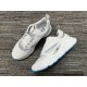 Dior B22 Off-White Trainers Pair View in off-white and blue Dior B22 off-white trainer pair top view layout in off-white and blue
