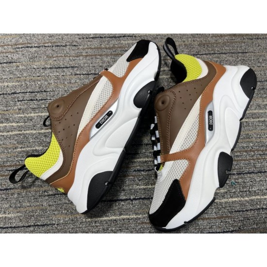 Dior B22 Brown Low Top Trainers Pair View in brown and lime Pair of Dior B22 brown leather trainers resting on a patterned carpet surface in brown and lime