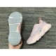 Dior B22 Pink Trainer Sole and Tread View in pink and white Bottom grey rubber tread sole view of Dior B22 Pink Trainer next to shoe side profile in pink and white