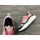 Close up of the padded collar and pink mesh tongue on Dior B22 trainer in pink and white
