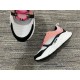 Front toe box detail of Dior B22 trainer with white mesh and black suede toe cap in pink and white