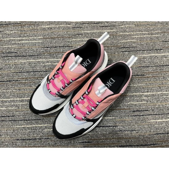 Top down view of a pair of Dior B22 trainers in pink and white