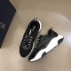 Dior B22 Black Trainers Angled Top Angle in black and white Angled top view of Dior B22 trainers in black mesh and leather panel construction in black and white