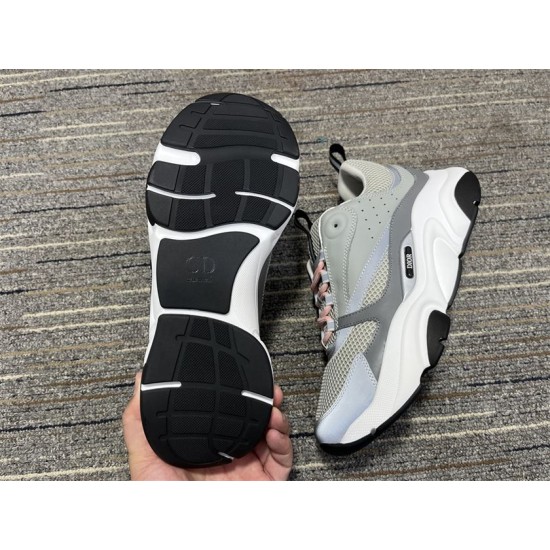 Dior B22 Grey Trainer Outsole Sole View in grey and white Underside view showing black textured outsole and CD emblem on Dior B22 trainer in grey and white
