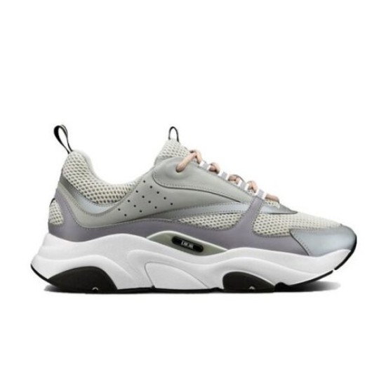 Dior B22 Grey Trainer Lateral View in grey and white Lateral view of Dior B22 grey and white trainer on white background