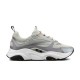 Dior B22 Grey Trainer Lateral View in grey and white Lateral view of Dior B22 grey and white trainer on white background