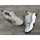 Dior B22 Grey Trainers Overhead Angle in grey and white Angled overhead view of grey and white Dior B22 trainers