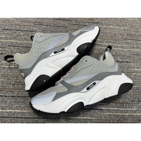 Dior B22 Grey Trainers Side Profiles in grey and white Both side profiles of grey Dior B22 chunky trainers facing opposite directions in grey and white