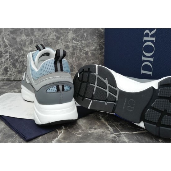 Dior B22 Trainers Heel and Sole View in grey and white Rear view showing heel pull tab and textured black rubber sole base of the trainer in grey and white