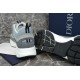 Dior B22 Trainers Heel and Sole View in grey and white Rear view showing heel pull tab and textured black rubber sole base of the trainer in grey and white