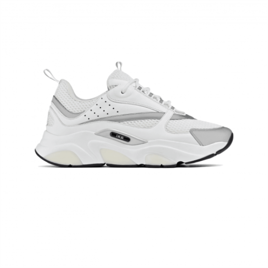 Dior B22 Trainer Studio Side View in white and silver Studio profile shot of Dior B22 trainer in white mesh and silver leather trim