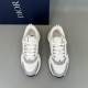 Dior B22 Trainers Top View in white and silver Top-down view of white Dior B22 trainers showing toe box and lace system in white and silver