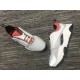 Overhead and side profile view of Dior B22 White Grey Red Trainers pair