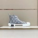 Dior B23 Grey Trainer Display View Dior B23 grey patterned high-top trainer sitting on display shelf
