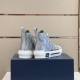 Dior B23 Trainers Rear Heel View in grey Rear view of Dior B23 grey fabric high-top trainers showing heel tabs