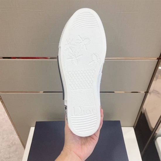 Dior B23 High-Top Trainer Monogram Canvas White Blue Outsole Underneath view of the white tread sole of Dior B23 High-Top Trainer Monogram Canvas White Blue