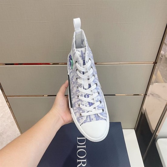 Dior B23 High-Top Trainer Monogram Canvas White Blue Top Perspective Top perspective of single Dior B23 High-Top Trainer Monogram Canvas White Blue held in hand