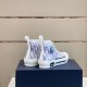 Dior B23 High-Top Trainers Monogram Canvas White Blue Heel View Rear angle view of Dior B23 High-Top Trainers Monogram Canvas White Blue heel pull tabs