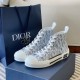 Dior B23 High Top Blue Oblique Trainers with Box and Bag Three-quarter view of Dior B23 High Top Blue Monogram Trainers with packaging