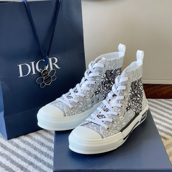 Dior B23 High Top Trainers Printed Pattern White Black Packaging Display Dior B23 High Top Trainers Printed Pattern White Black pair standing with packaging bag