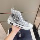 Dior B23 High Top Trainers Printed Pattern White Black Handheld View Dior B23 High Top Trainers Printed Pattern White Black single shoe held in hand