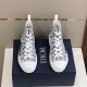 Dior B23 High-Top Canvas Trainers Top View in black and white Top-down view of Dior B23 High-Top Canvas Trainers In Black And White resting on box