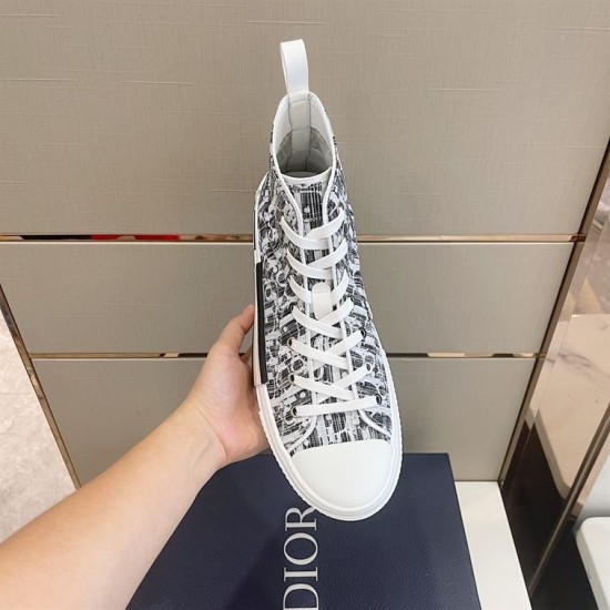 Dior B23 High-Top Canvas Trainers Handheld Top View in black and white Handheld top view showing laces of Dior B23 High-Top Canvas Trainers In Black And White
