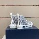 Dior B23 High-Top Canvas Trainers Rear View in black and white Rear view showing heel design of Dior B23 High-Top Canvas Trainers In Black And White