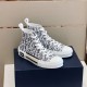 Dior B23 High-Top Canvas Trainers Angled Pair View in black and white Angled pair view of Dior B23 High-Top Canvas Trainers In Black And White on box