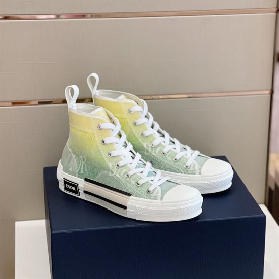 Dior B23 High-Top Trainers Three-Quarter View in green and yellow Three-quarter side angle of Dior B23 trainers highlighting green and yellow gradient canvas design