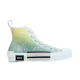 Dior B23 High-Top Trainers Side View in green and yellow Profile view of Dior B23 high-top trainers in green and yellow gradient canvas with white rubber sole