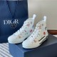 Dior B23 High Top White Printed Oblique Canvas Trainers Angled Pair Pair of Dior B23 High Top White Printed Oblique Canvas Trainers angled next to packaging