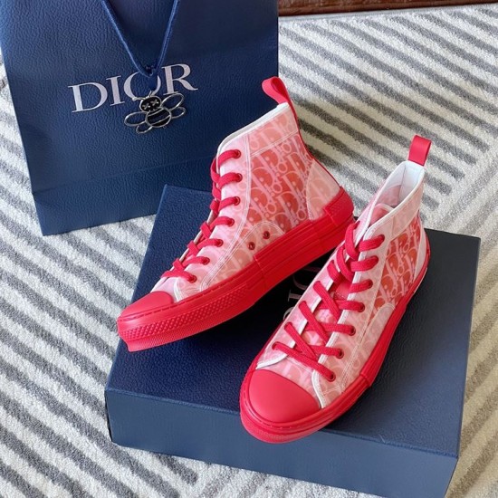 Dior B23 High Top Oblique Red Trainers Set View in red and white Dior B23 High Top Oblique Red Trainers pair placed on box next to gift bag in red and white