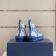 Dior B23 High-Top Oblique Canvas Blue Trainers Heel View Rear view of Dior B23 High-Top Oblique Canvas Blue Trainers showing heel tabs
