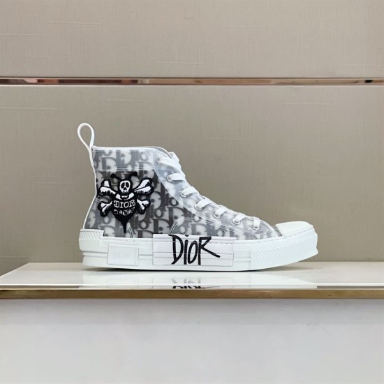 Dior B23 Trainer Side Profile in white and grey Side profile of Dior B23 white monogram trainer on display ledge in white and grey
