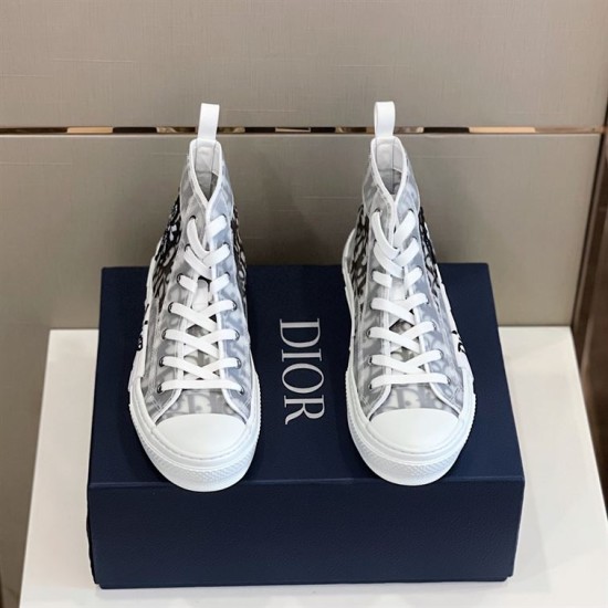 Dior B23 High-Top Trainers Top View in white and grey Front aerial view of pair of white Dior B23 high-top trainers on box in white and grey