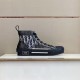 Dior Dark Grey Oblique High-Top Trainers Display View in grey and white Side view of dark grey Dior Oblique high-top trainers resting on display shelf in grey and white