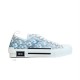 Dior B23 Low Top Oblique Monogram Blue Trainers Side View in blue and white Side profile view of Dior B23 Low Top Oblique Monogram Blue Trainers on white background