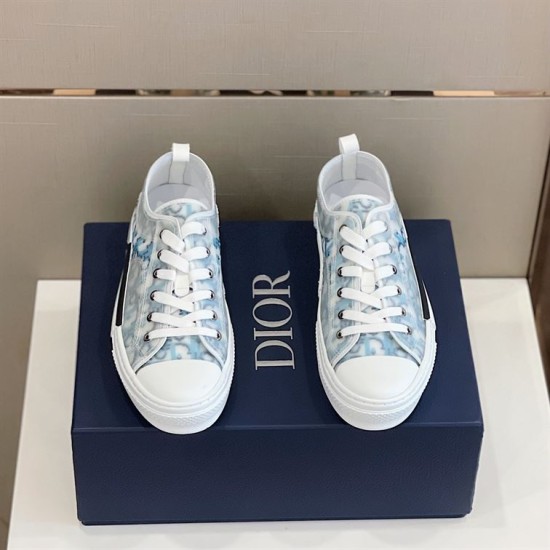 Dior B23 Low Top Oblique Monogram Blue Trainers Pair Top View in blue and white Top-down view of both Dior B23 Low Top Oblique Monogram Blue Trainers resting on shoe box in blue and white