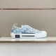 Dior B23 Low Top Oblique Monogram Blue Trainers Shelf View in blue and white Side view of Dior B23 Low Top Oblique Monogram Blue Trainers displayed on a shelf in blue and white