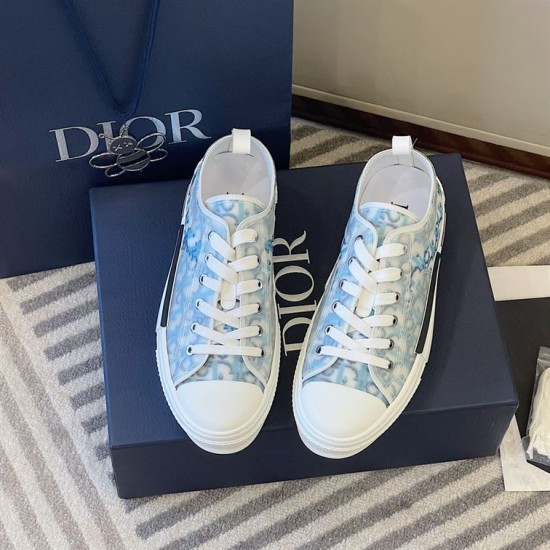 Dior B23 Low Top Oblique Monogram Blue Trainers Overhead View in blue and white Overhead view of Dior B23 Low Top Oblique Monogram Blue Trainers with packaging in blue and white