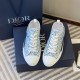 Dior B23 Low Top Oblique Monogram Blue Trainers Overhead View in blue and white Overhead view of Dior B23 Low Top Oblique Monogram Blue Trainers with packaging in blue and white