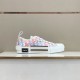 Dior B23 Multicolour Low-Top Trainer Profile in multicolour and white Lateral side view of Dior B23 multicolour low-top trainer displayed on a display shelf in multicolour and white