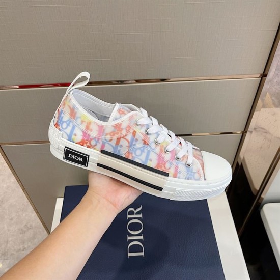 Dior B23 Low-Top Trainer Lateral Detail in multicolour and white Handheld lateral view of Dior B23 multicolour low-top trainer showing midsole inserts in multicolour and white
