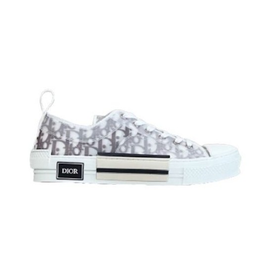 Studio profile shot of white and grey Dior B23 low-top Oblique trainer