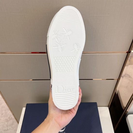 Underside view of white rubber sole on Dior B23 trainer with floral tread details in grey and white