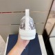 Rear view of Dior B23 trainer showing white heel tab and textured midsole in grey and white