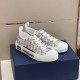 Three-quarter view of grey Oblique print Dior B23 low-top trainers on box in grey and white