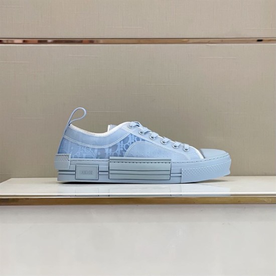 Light Blue Dior B23 Low Top Trainer Profile in light blue and white Side view of light blue Dior B23 trainer displayed on a marble surface in light blue and white