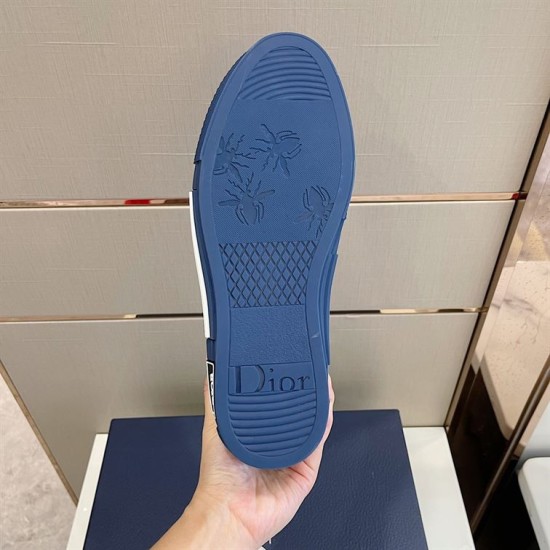 Underside view of navy blue rubber sole on Dior B23 low-top trainer